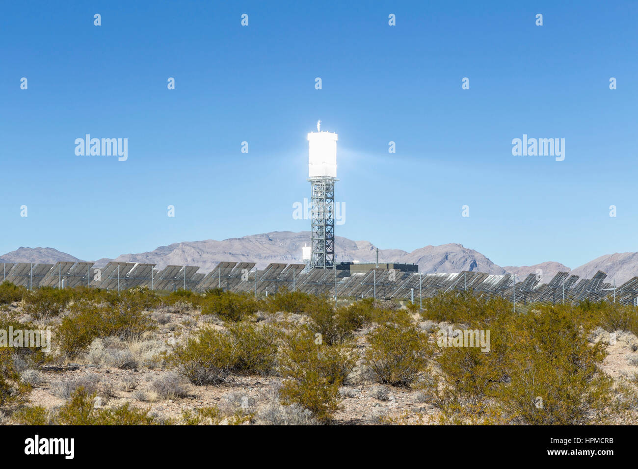 Ivanpah, California, USA - November 26, 2014:  Solar reflective power tower at the Ivanpah solar power station in the Mojave desert. Stock Photo