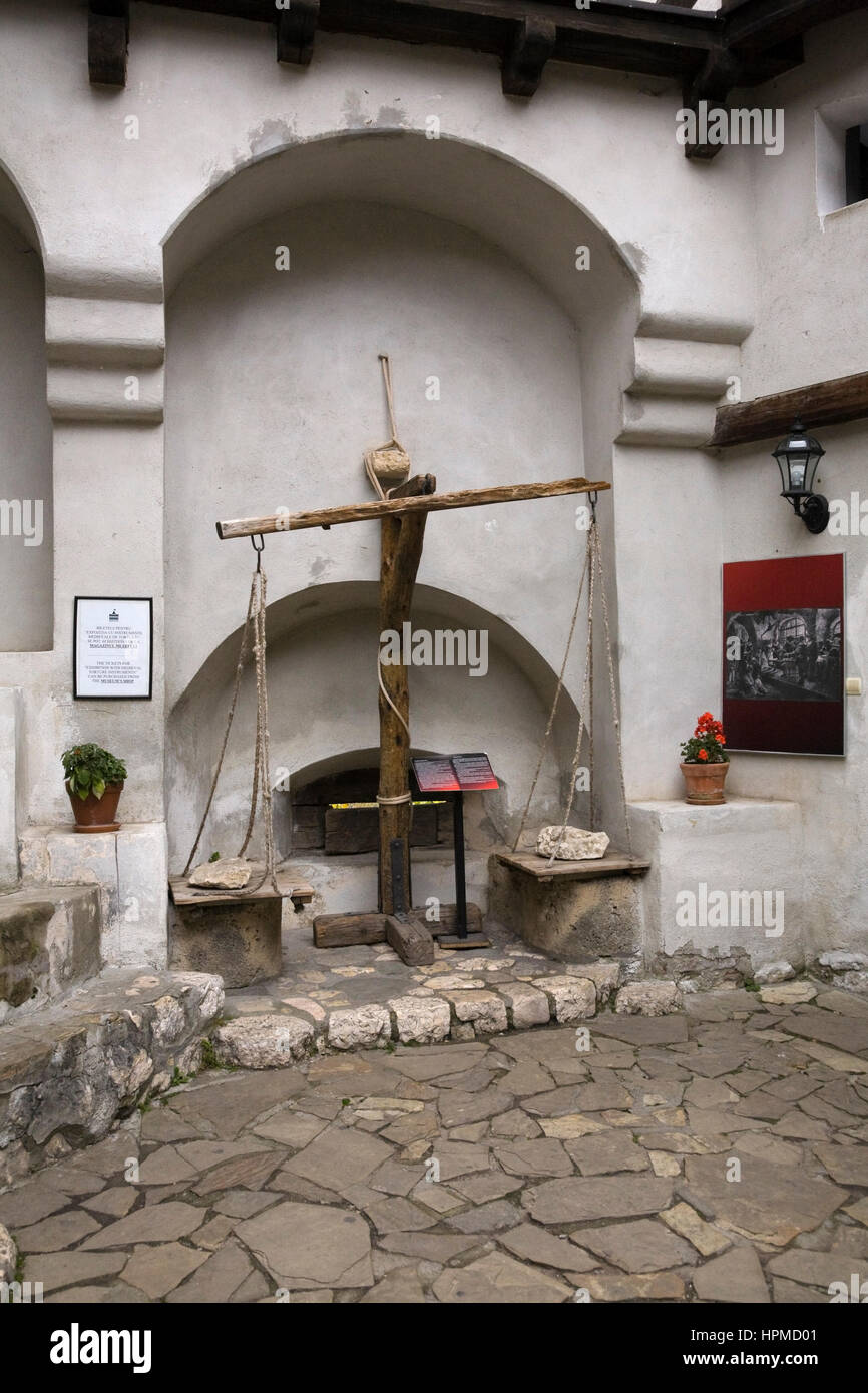 Medieval torture instruments exhibition in Bran castle courtyard, Transylvania, Romania, Eastern Europe. Stock Photo