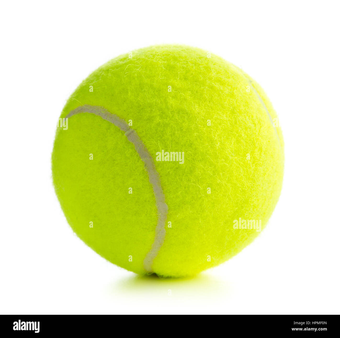 Single tennis ball isolated on white background. Stock Photo
