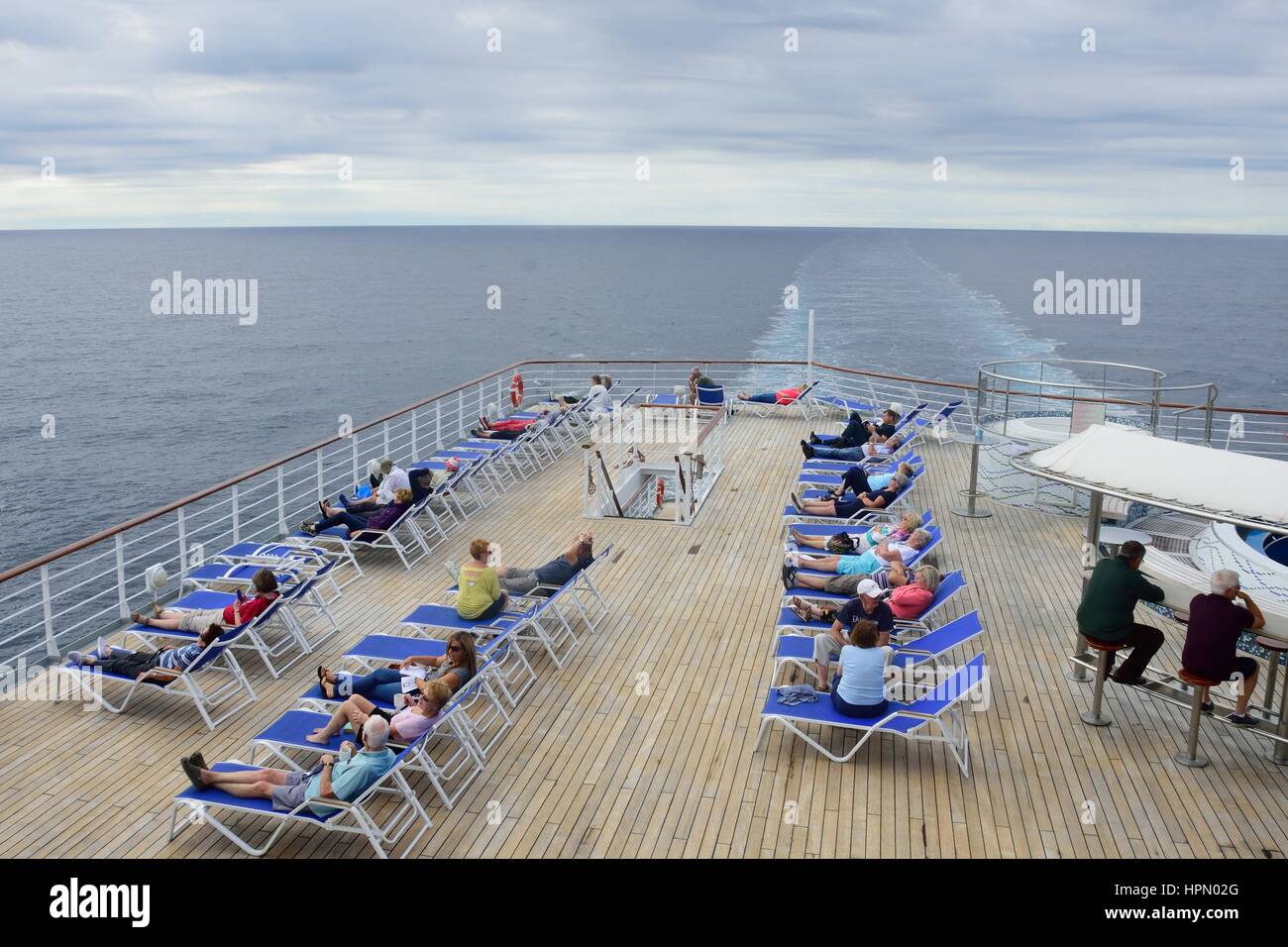 Passengers relaxing cruise deck hi-res stock photography and images - Alamy