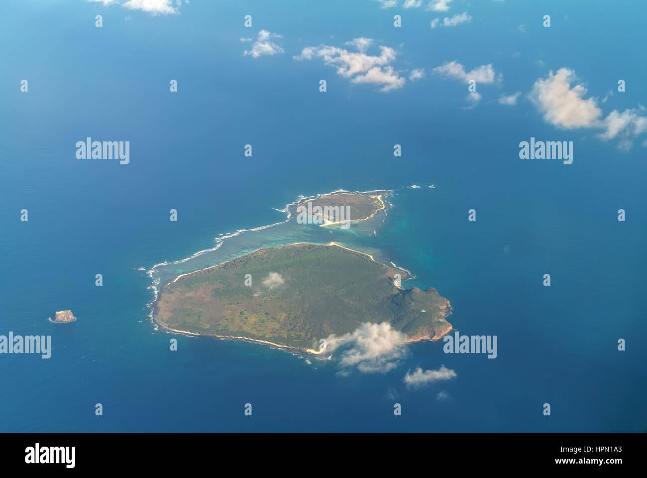 Aerial view of the Flat Island and Gabriel Island, islands in the Indian Ocean, governed by Mauritius. Pigeon House Rock is seen on the left. Stock Photo