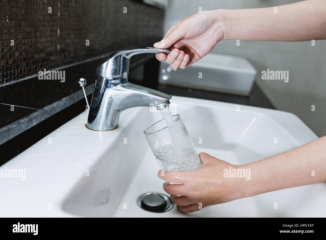 Filling A Glass Of Water From A Tap Stock Photos Filling A Glass
