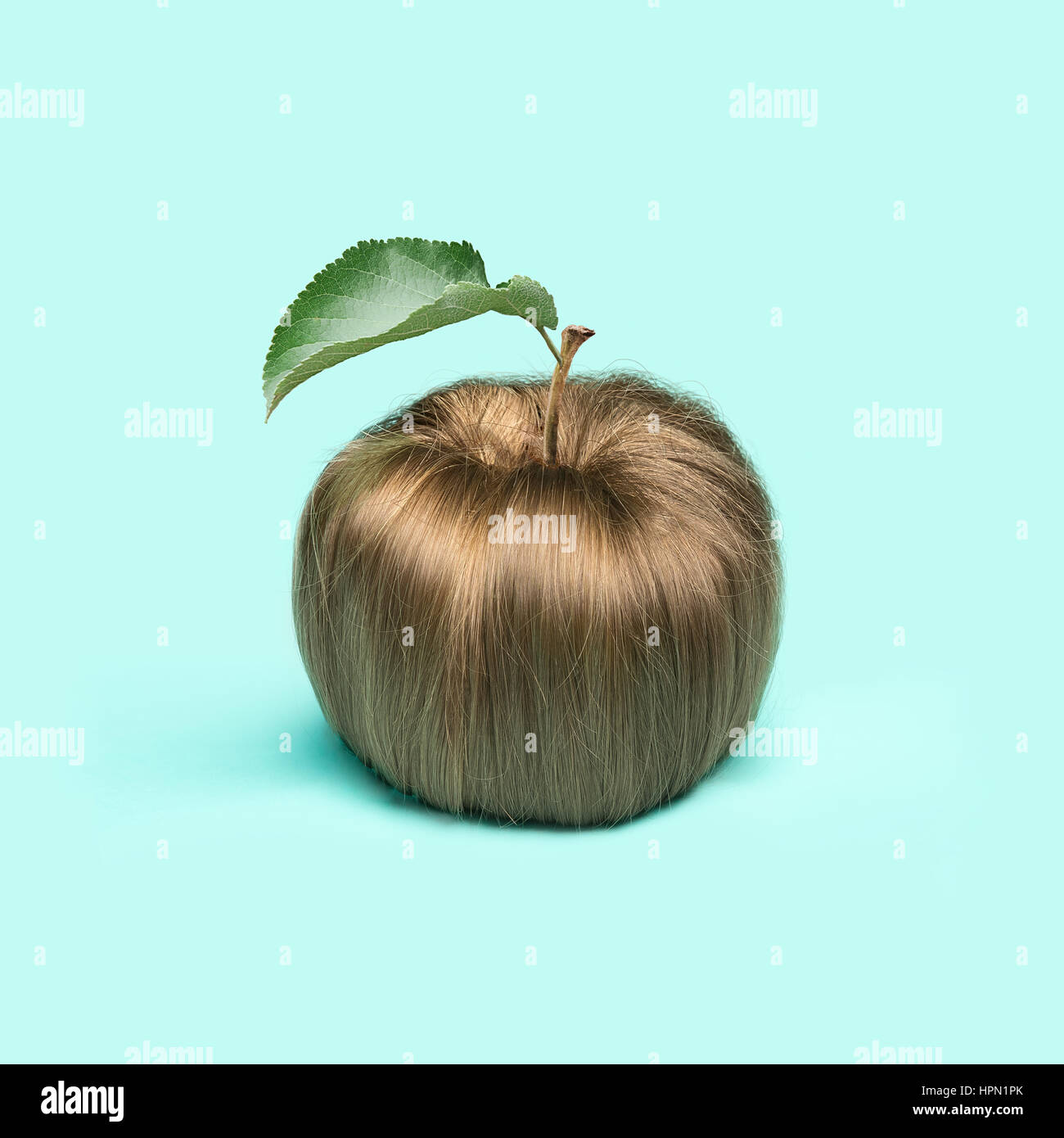 The women's hair in the form of an apple Stock Photo