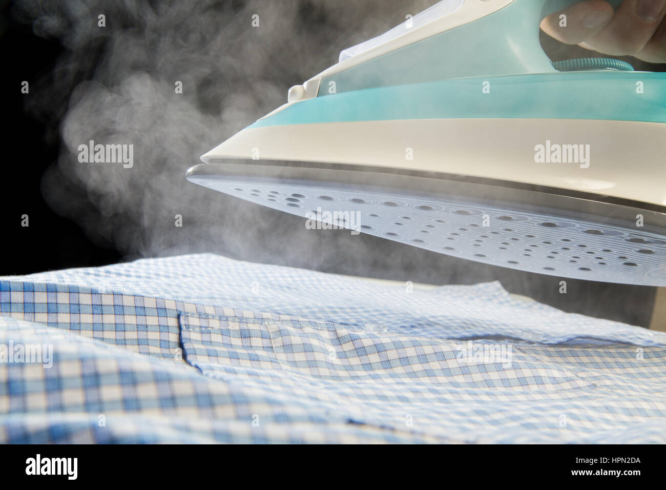 Steam iron clothes hires stock photography and images Alamy
