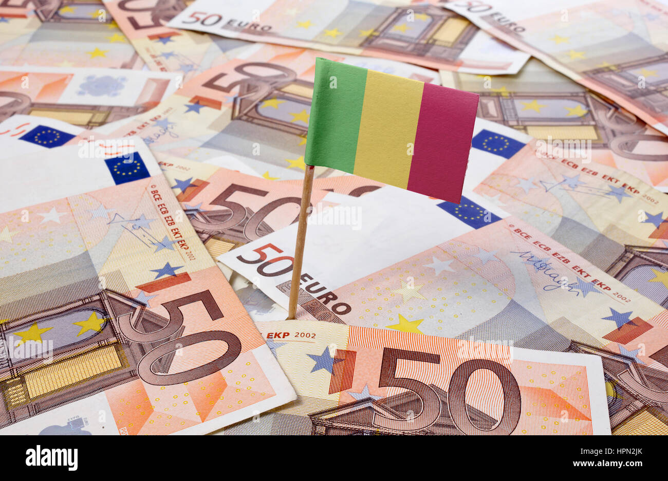 Flag of Mali sticking in european banknotes.(series Stock Photo - Alamy