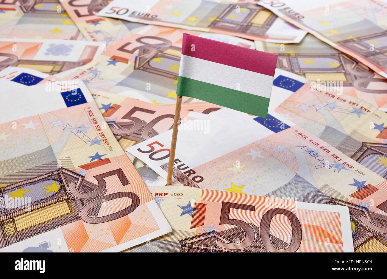 Flag of Hungary sticking in european banknotes.(series) Stock Photo