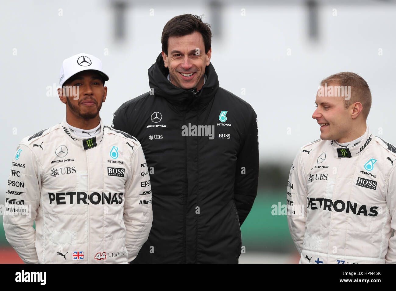 (From left to right) Lewis Hamilton, team principal Toto Wolff and Valtteri Bottas during the Mercedes-AMG 2017 Car Launch at Silverstone, Towcester. Stock Photo