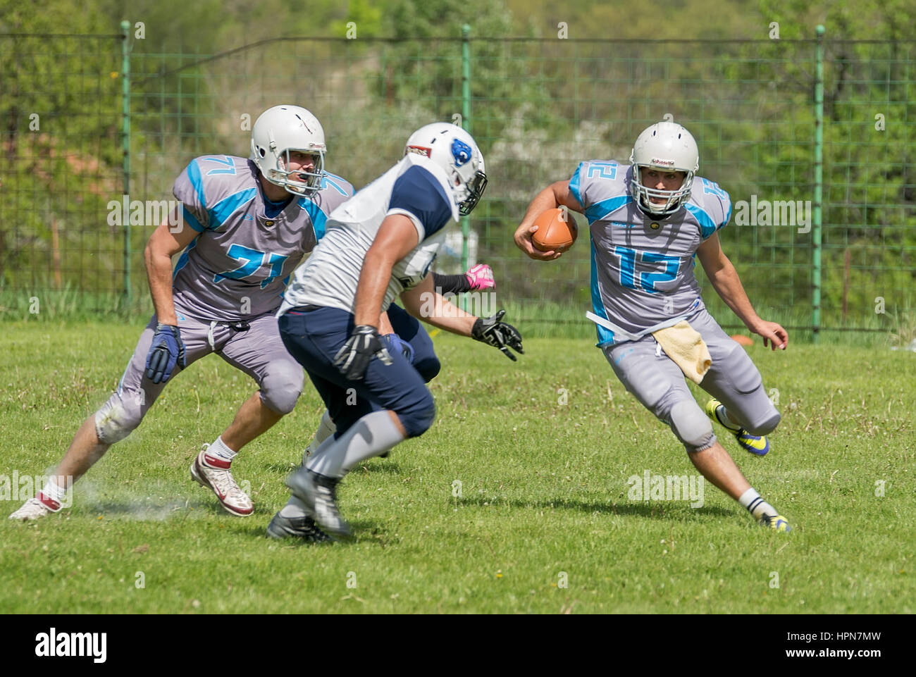 American football practice match on a sunny day Stock Photo