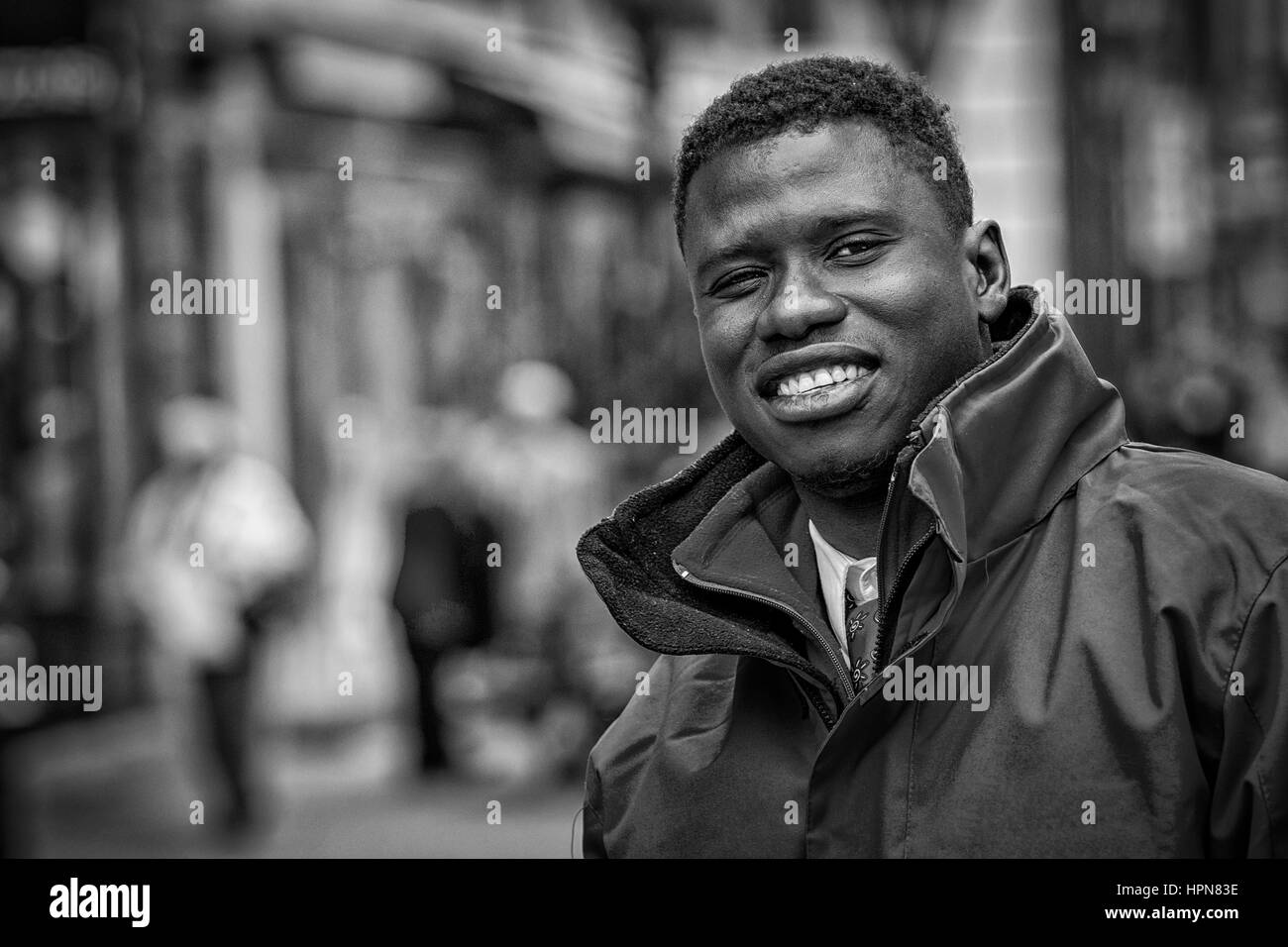 Budapest, Hungary - April  11. 2016: Big guy with a big smile at the street posing in front of camera Stock Photo