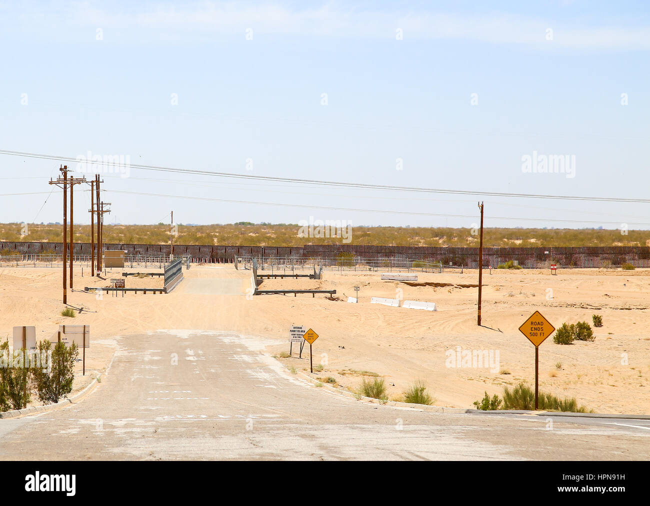 Winterhaven, California, USA May 26, 2015 Dead end road at the fence