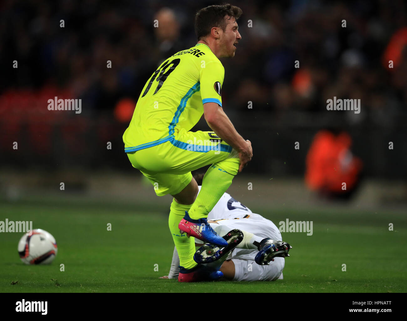 Tottenham Hotspur's Dele Alli challenges Gent's Brecht Dejaegere leading to a red card for Alli