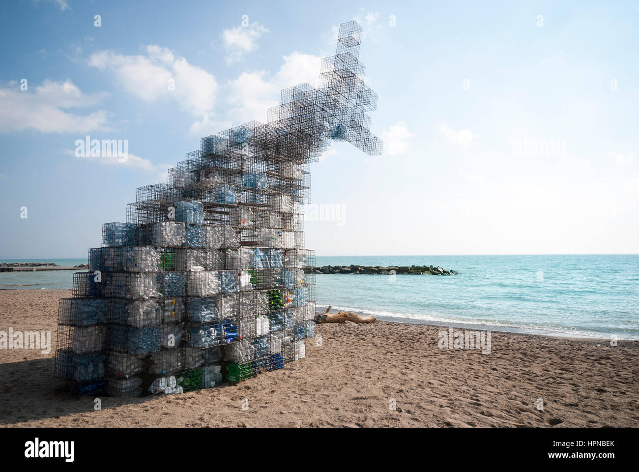 A wire mesh sculpture entitled Flotsam and Jetsam installed on Kew Beach in Toronto as part of the annual beach warming stations art exhibit Stock Photo