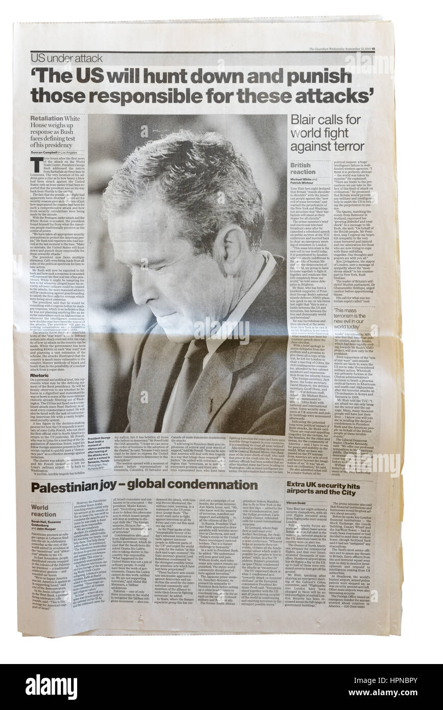 An article from The Guardian with a photo of George W Bush and that the US will hunt down and punish those responsible, a first step to war with Iraq Stock Photo