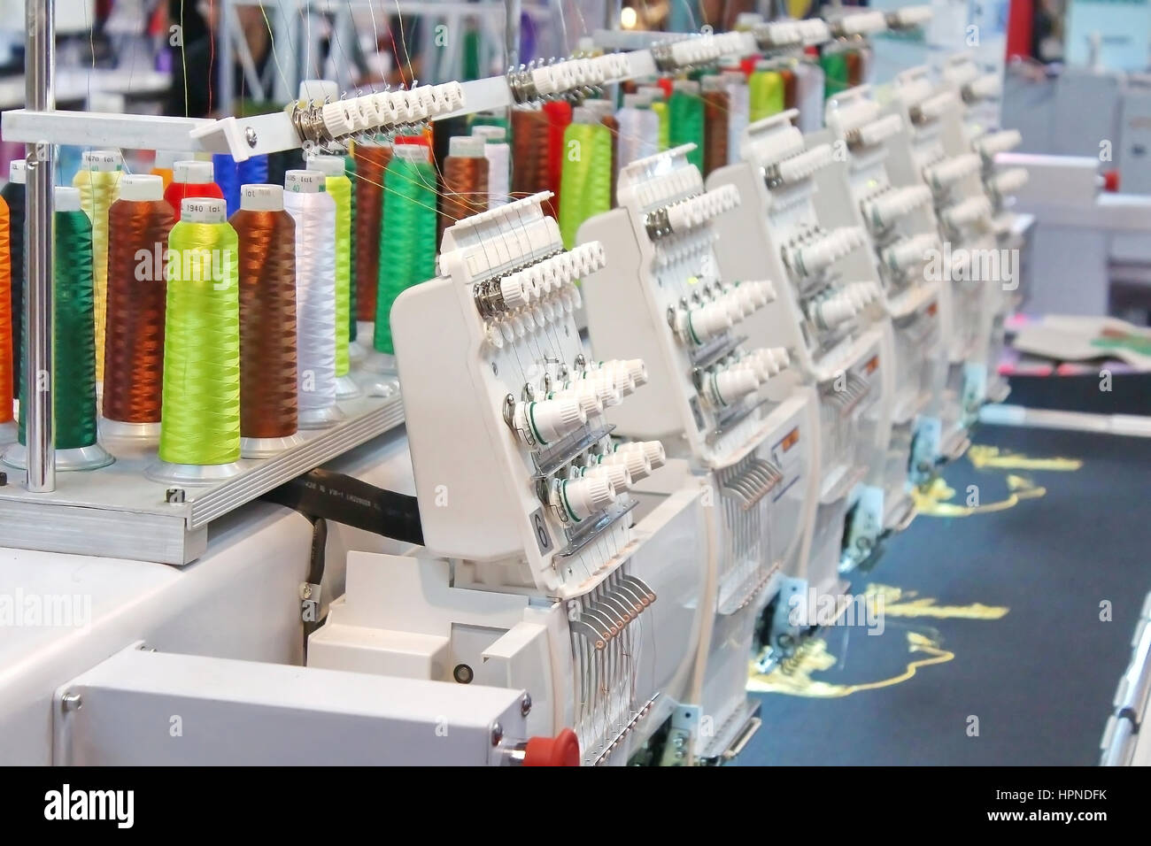 Closed up Embroidering process in the factory Stock Photo