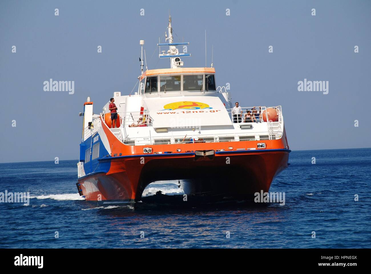 Dodekanisos Seaways catamaran ferry Dodekanisos Express arriving at the Greek island of Tilos on July 19, 2016. The vessel was built in 2000 in Norway Stock Photo