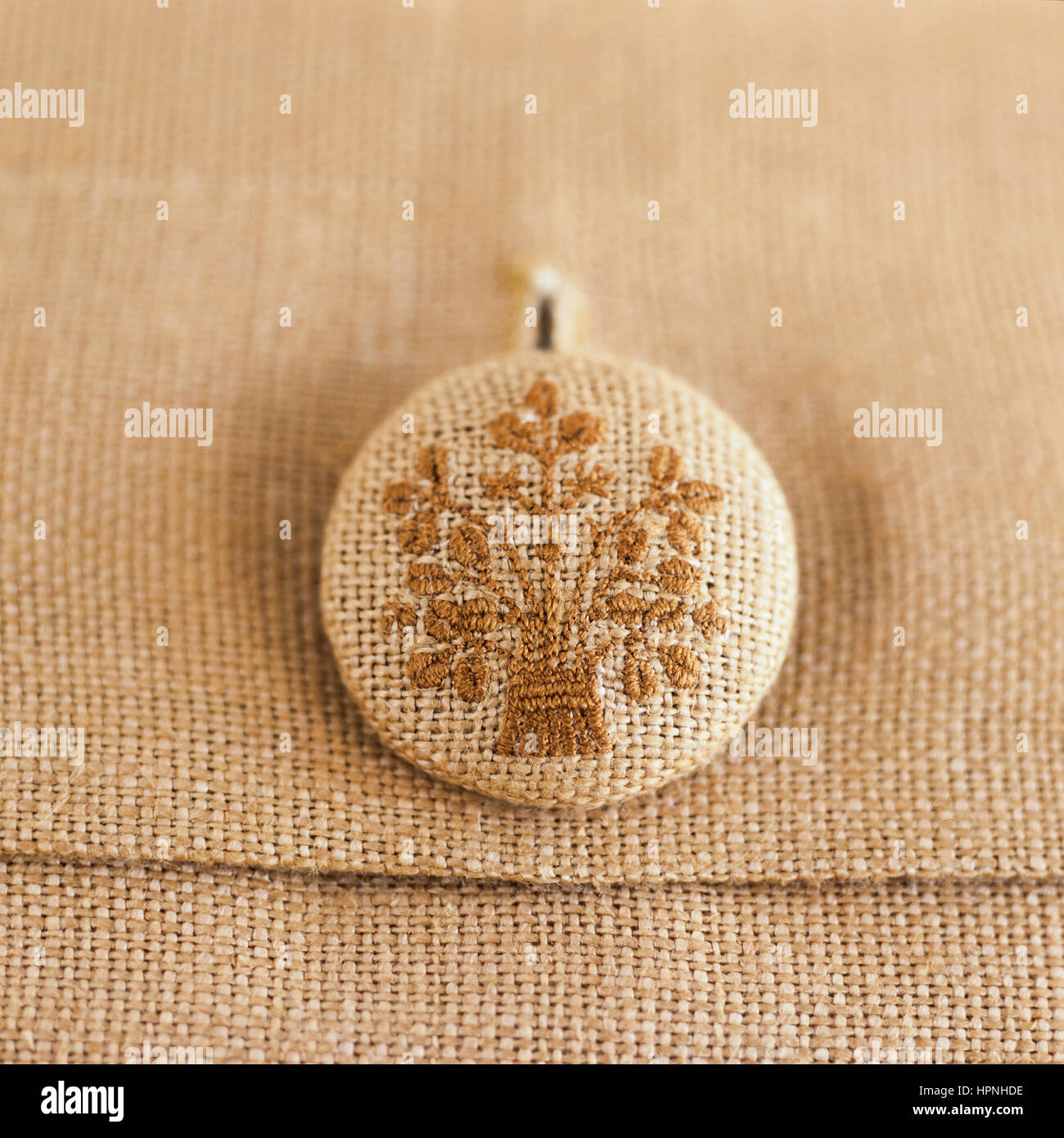 Close up of a textile button. Stock Photo