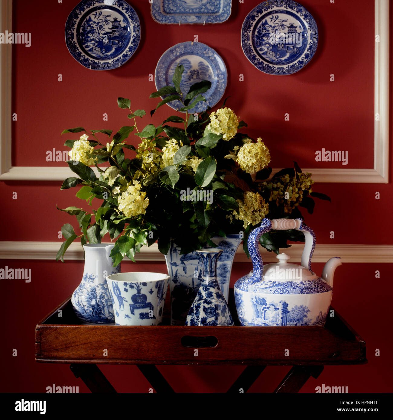 Wicker Chair And Baskets With Fresh And Dry Lavender Flowers In The Room  Next To It Is A Table With Vases And Candles Romantic Interior Of The Room  Tinted Photo High-Res Stock