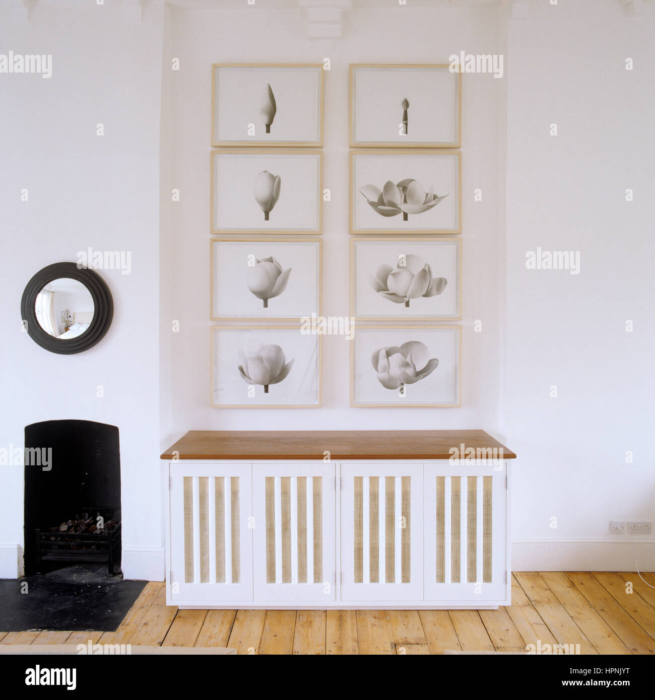 A side table by a fireplace. Stock Photo