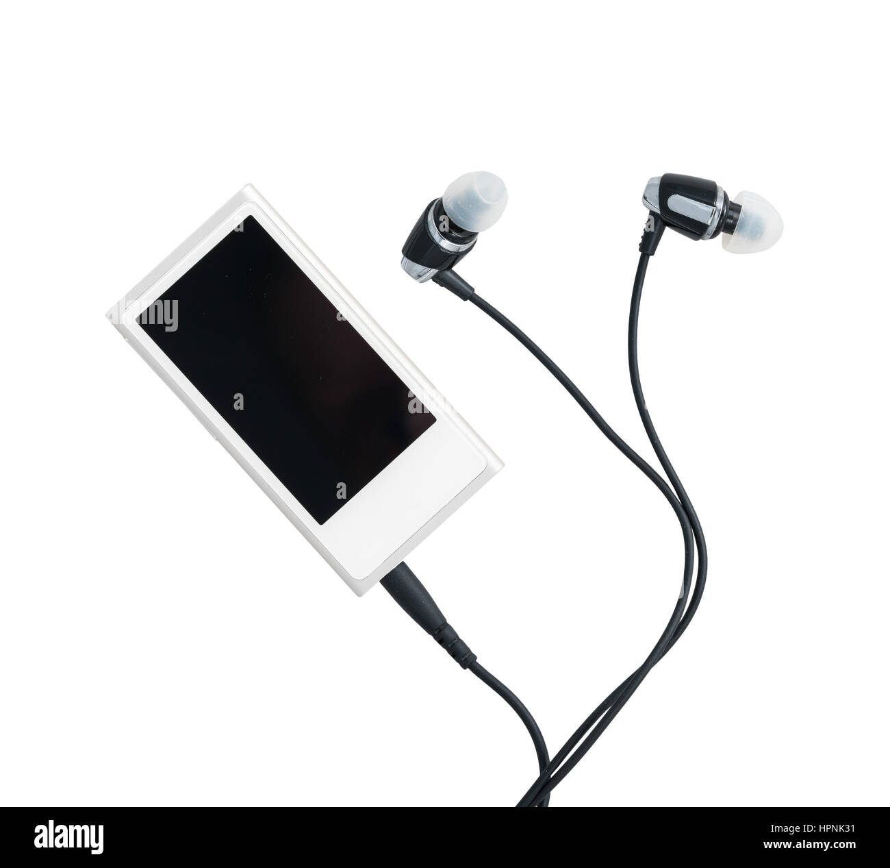 Small white portable MP3 digital music player with earbuds isolated against a white background Stock Photo