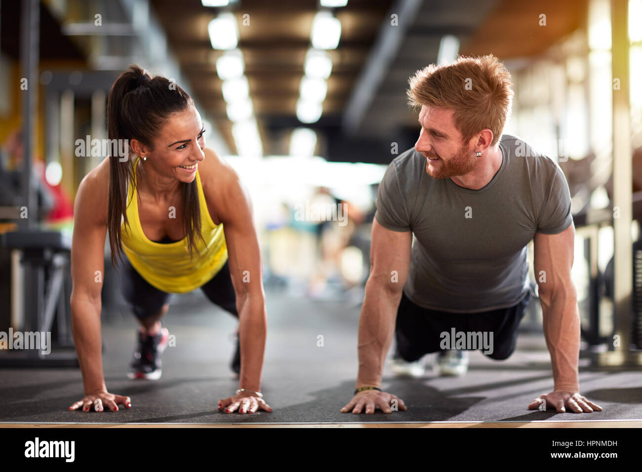 Female and male compete in endurance on fitness training Stock Photo