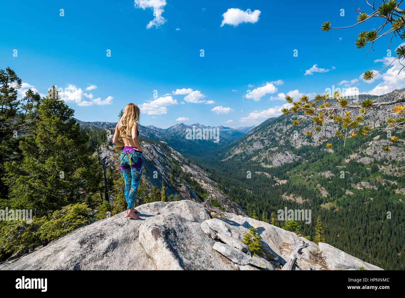 Noelle Synder climbs the Memorial Route on Slick Rock Stock Photo