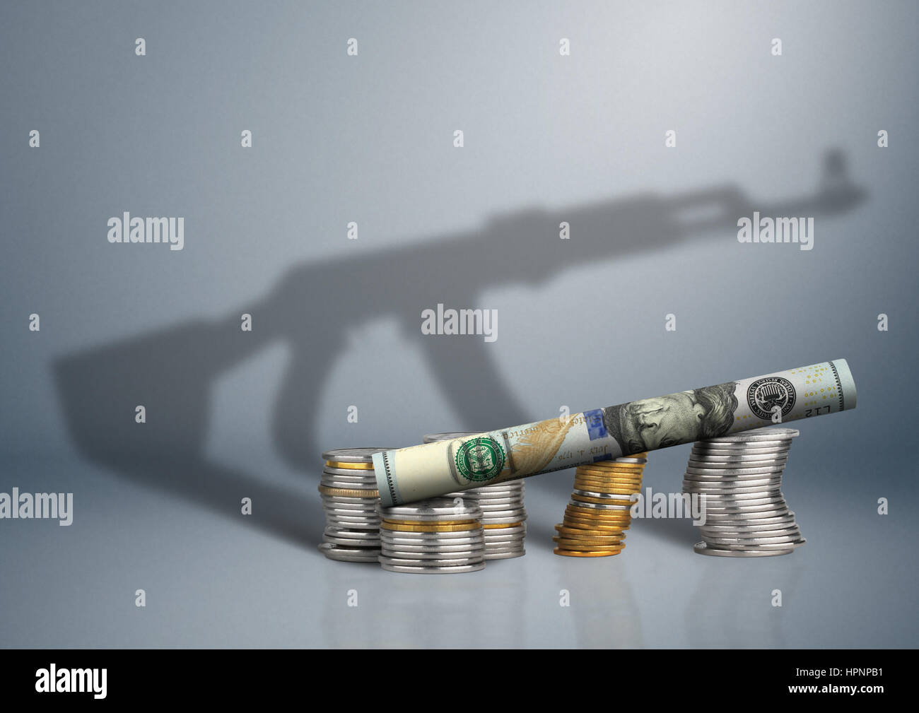 military budget concept, money with gun shadow Stock Photo