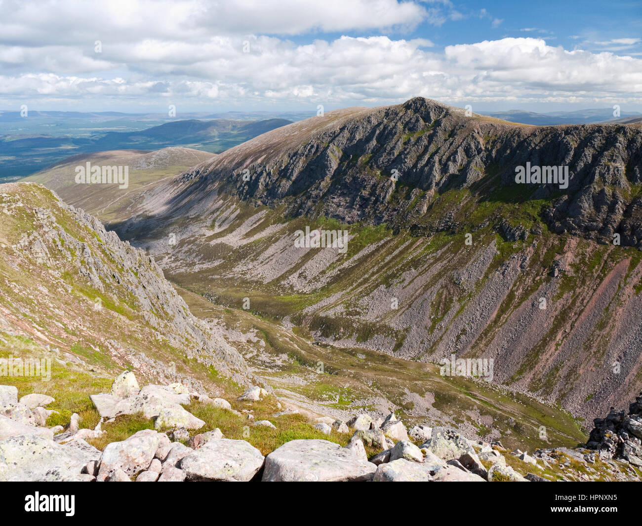 Lurcher's Crag (Creag an Leth-choin) viewed across the deep pass of the Lairig Ghru from Sron na Lairige in the Cairngorms National Park Stock Photo