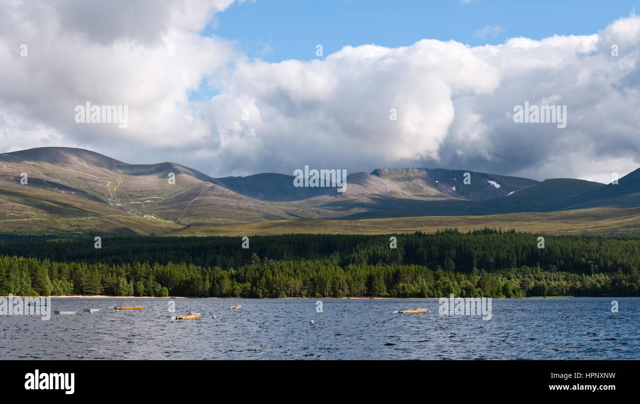 View across Loch Morlich to Cairn Gorm and the Northern Corries, the northern extent of the Cairngorms plateau, near Aviemore Stock Photo