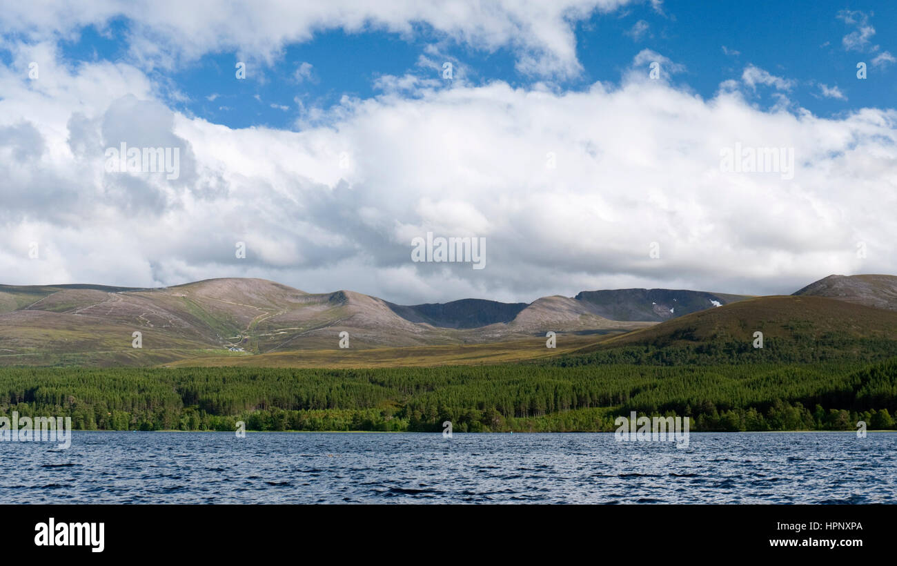 View across Loch Morlich to Cairn Gorm and the Northern Corries, the northern extent of the Cairngorms plateau, near Aviemore Stock Photo