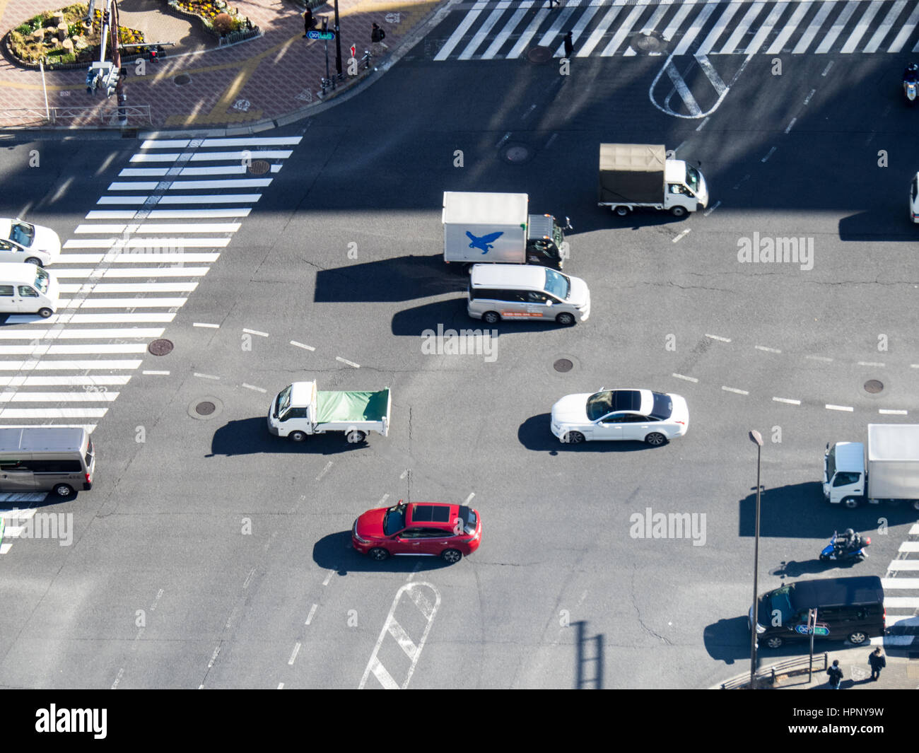 Overhead view of an intersection with moderate traffic in Bunkyo, Tokyo, Japan. Stock Photo