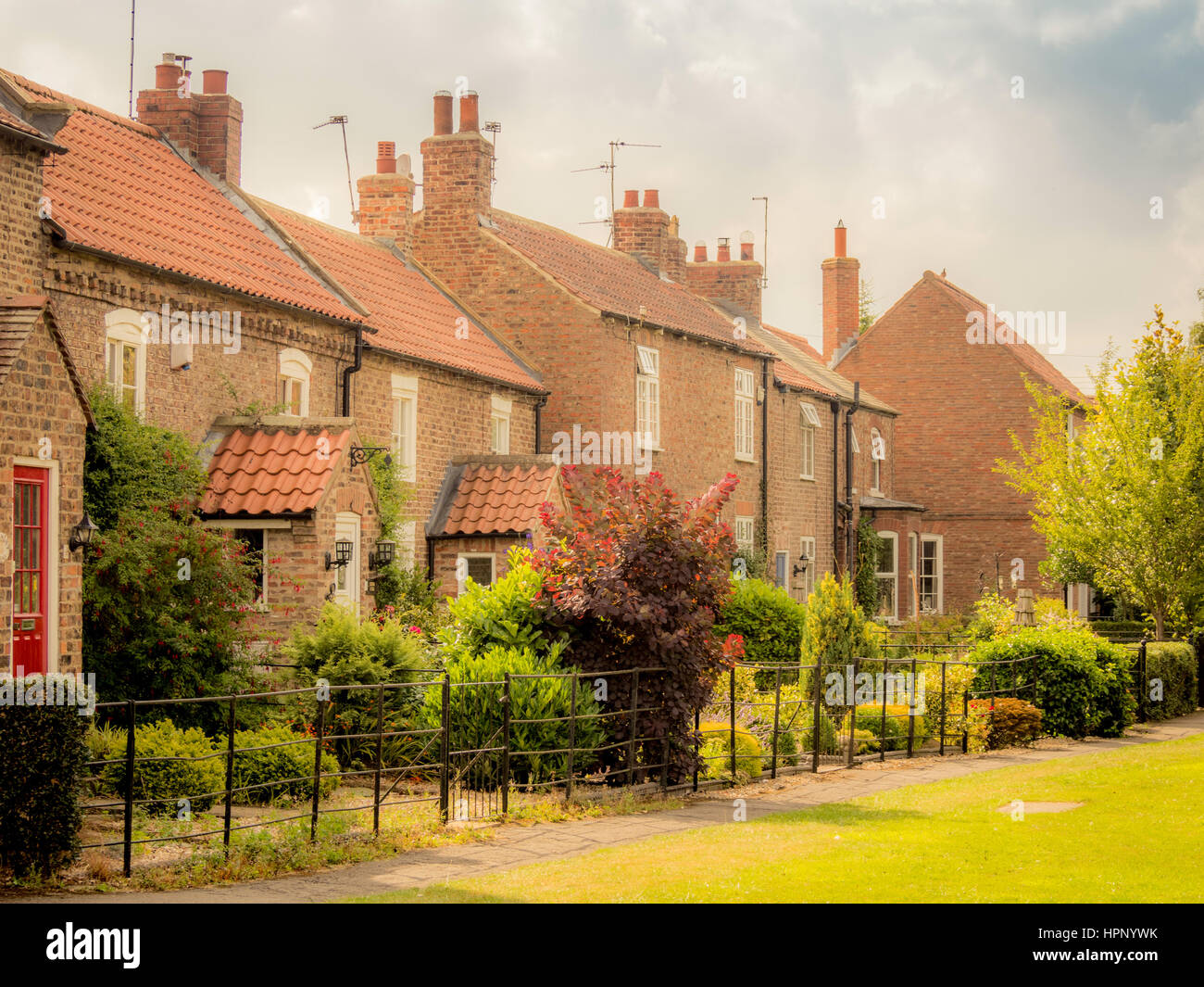 Traditional houses with front gardens, Haxby, Yorkshire, UK Stock Photo