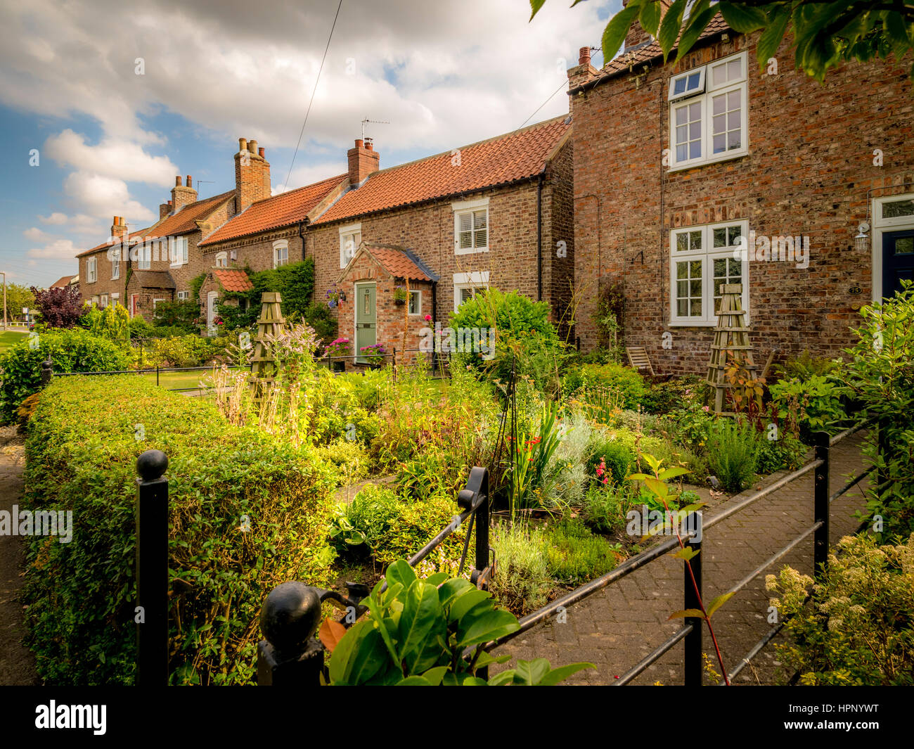 Traditional houses with front gardens, Haxby, Yorkshire, UK Stock Photo