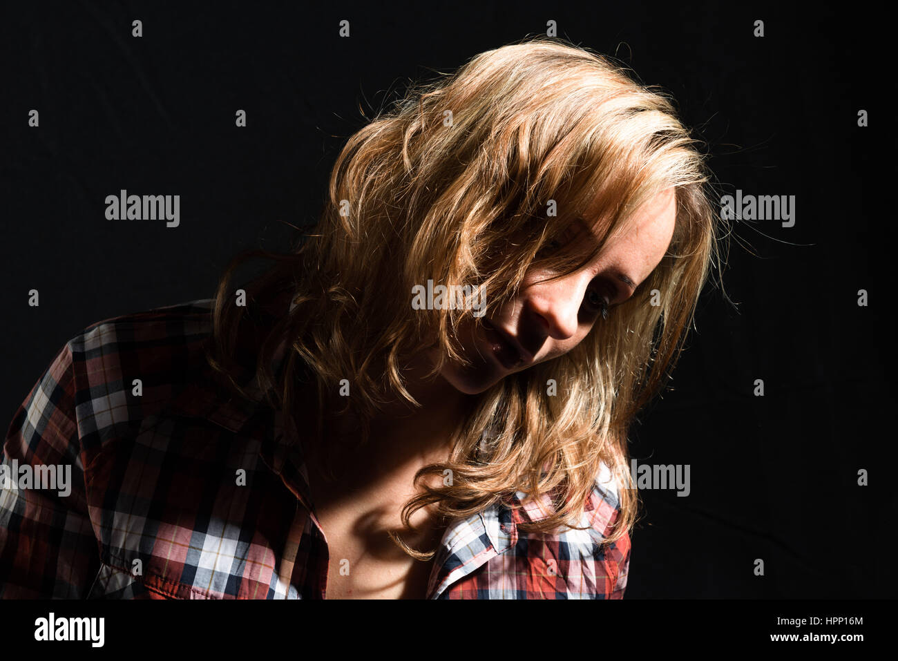 Portrait of a middle aged woman, studio shot Stock Photo