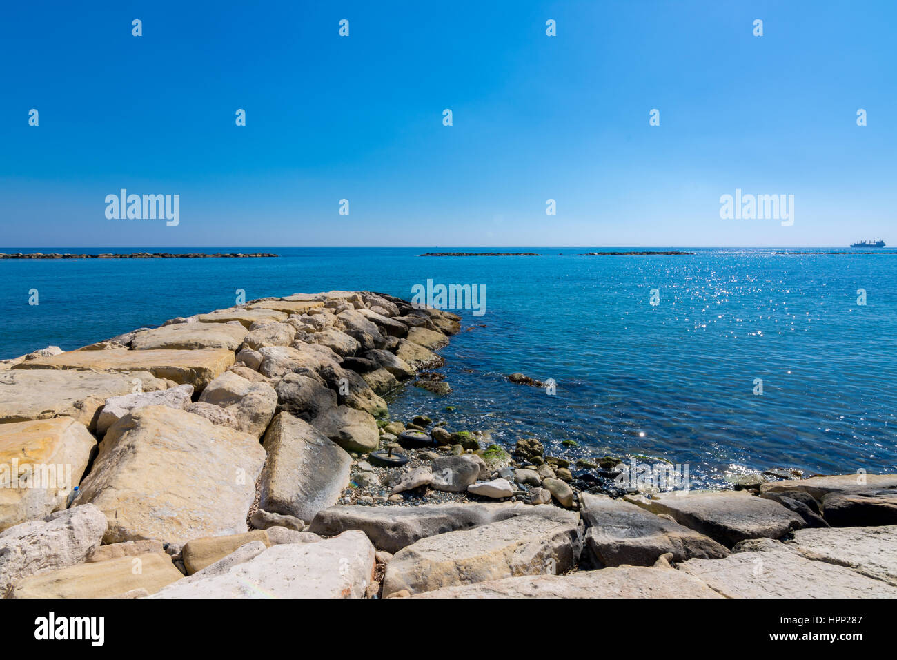 Scenic blue beach with clear sea waters at Germasogia, Limassol Cyprus Stock Photo