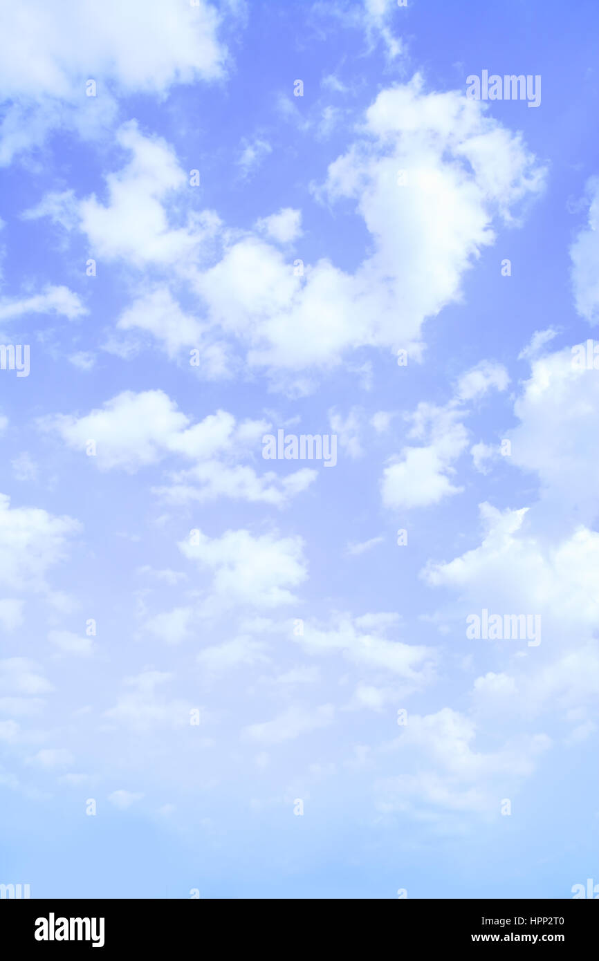 Blue sky with clouds - vertical background Stock Photo - Alamy