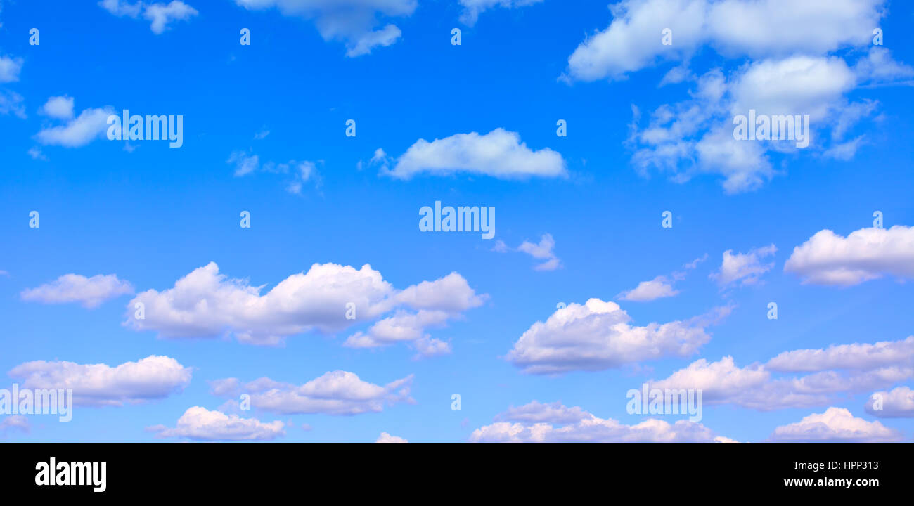 Blue sky with light cumulus clouds - panoramic view Stock Photo - Alamy