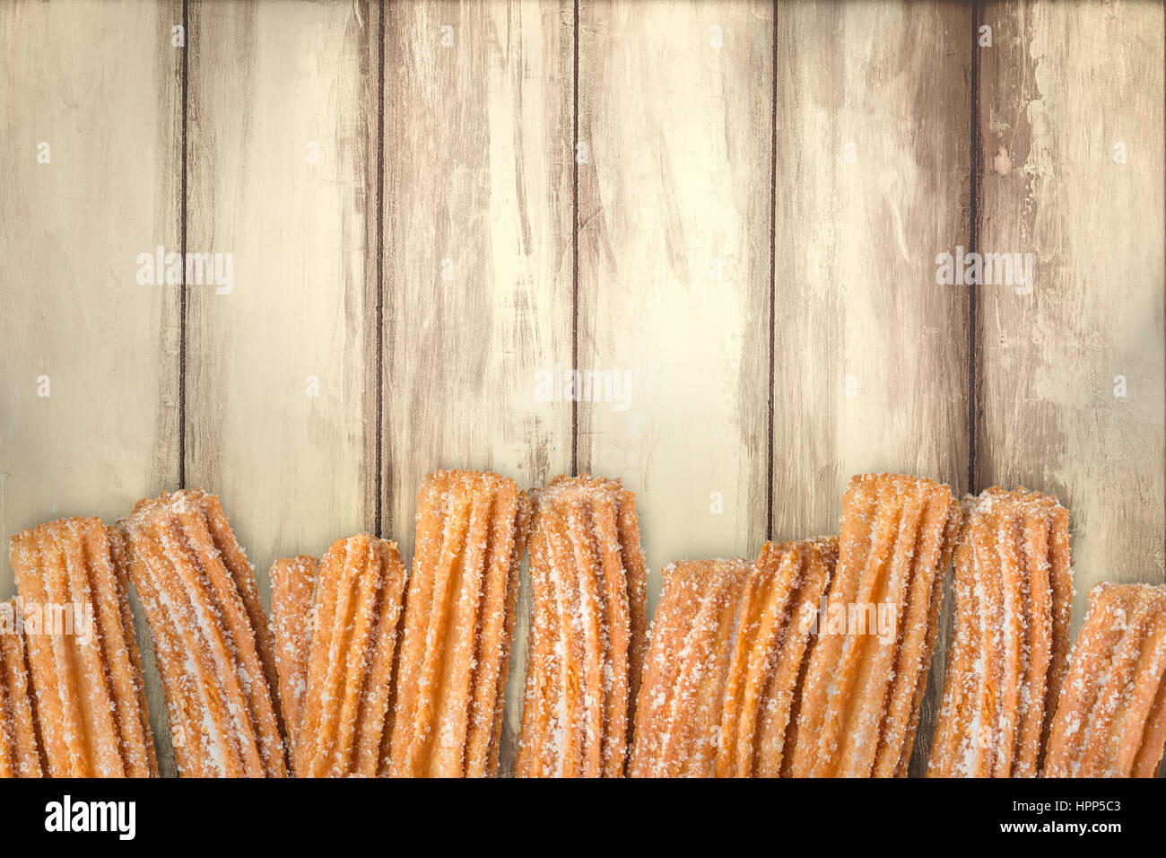 Churros Arranged In Row On Wooden Background Stock Photo Alamy Churros Arranged In Row On Wooden Background Stock Photo Alamy