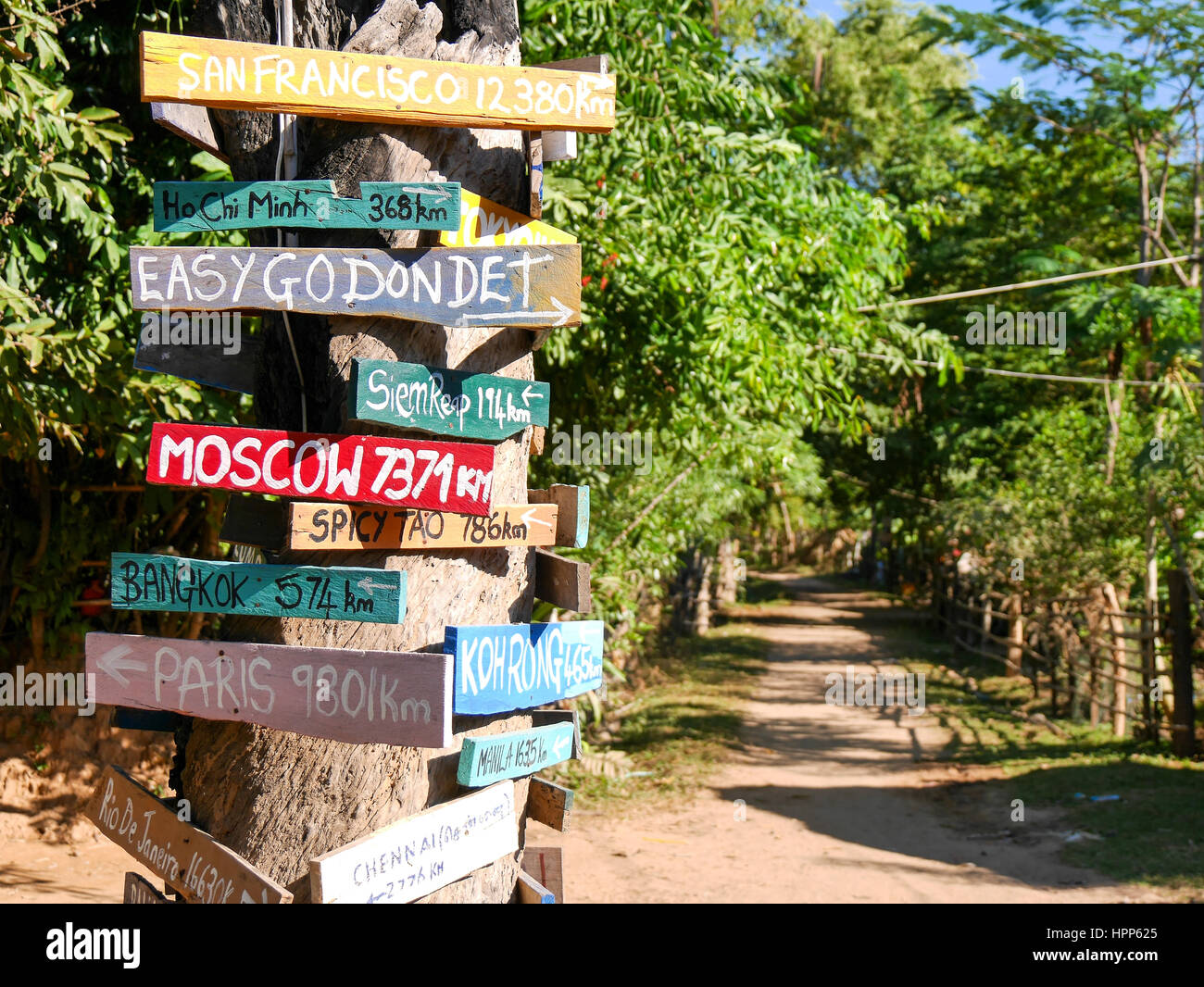 Funky Signposts Signpost with wooden signs in many colors Stock Photo - Alamy