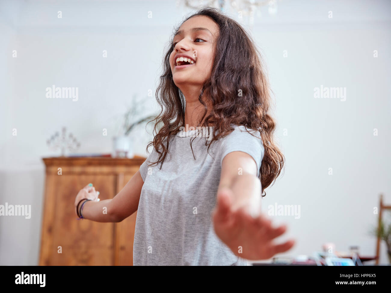 Happy girl dancing hi-res stock photography and images - Alamy
