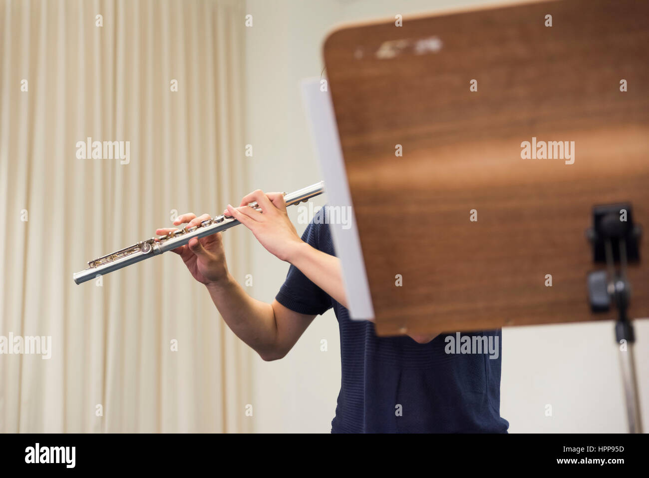 Woman playing flute Stock Photo Alamy