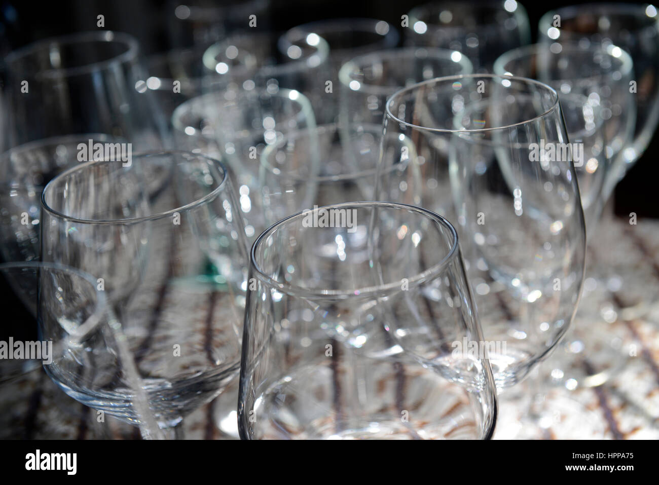 Wine Glasses set out for a dinner party. Stock Photo