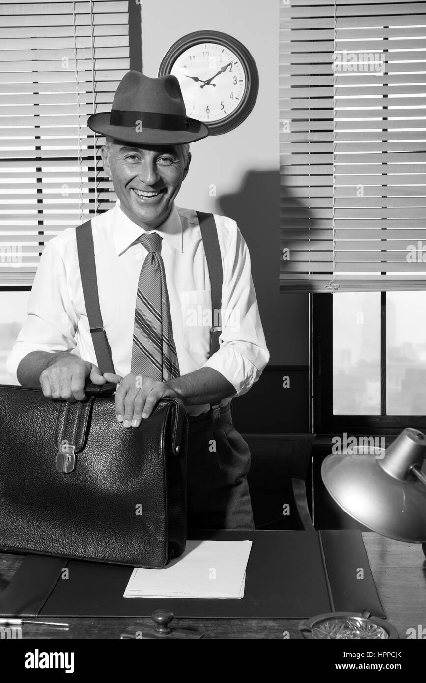 Smiling vintage businessman arriving at office with  display picture 3