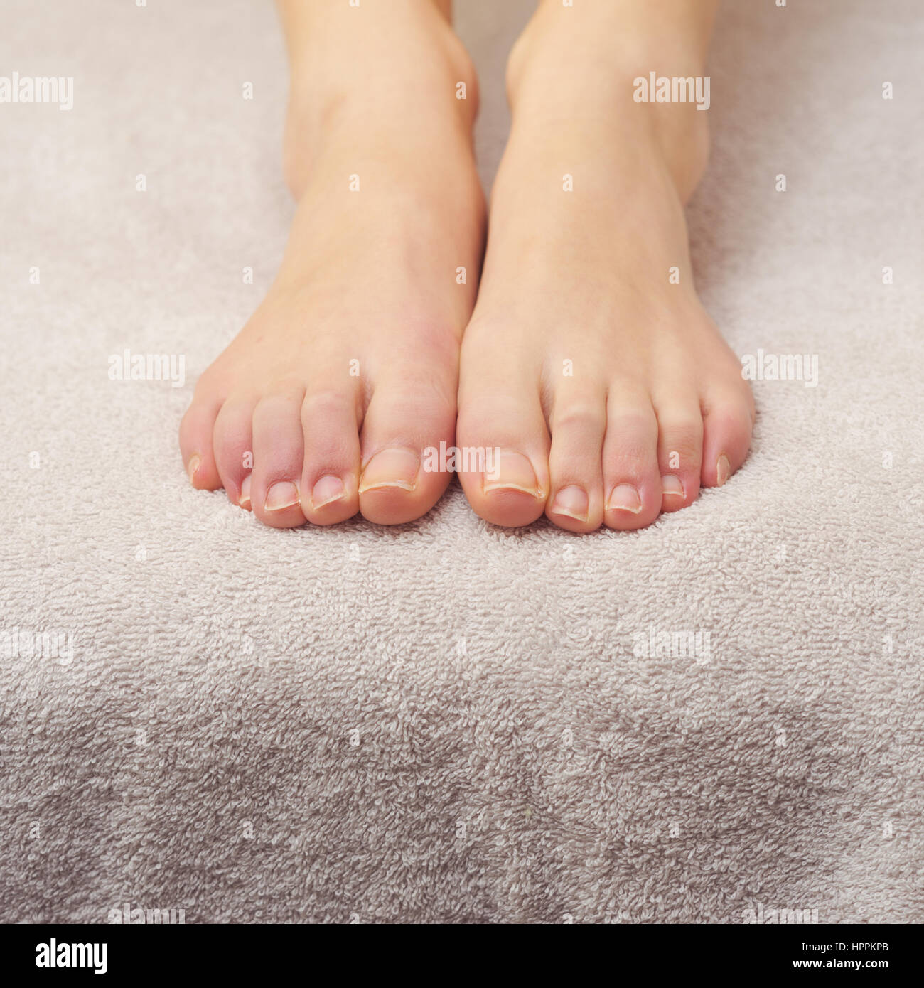 Beautiful female feet hi-res stock photography and images - Alamy
