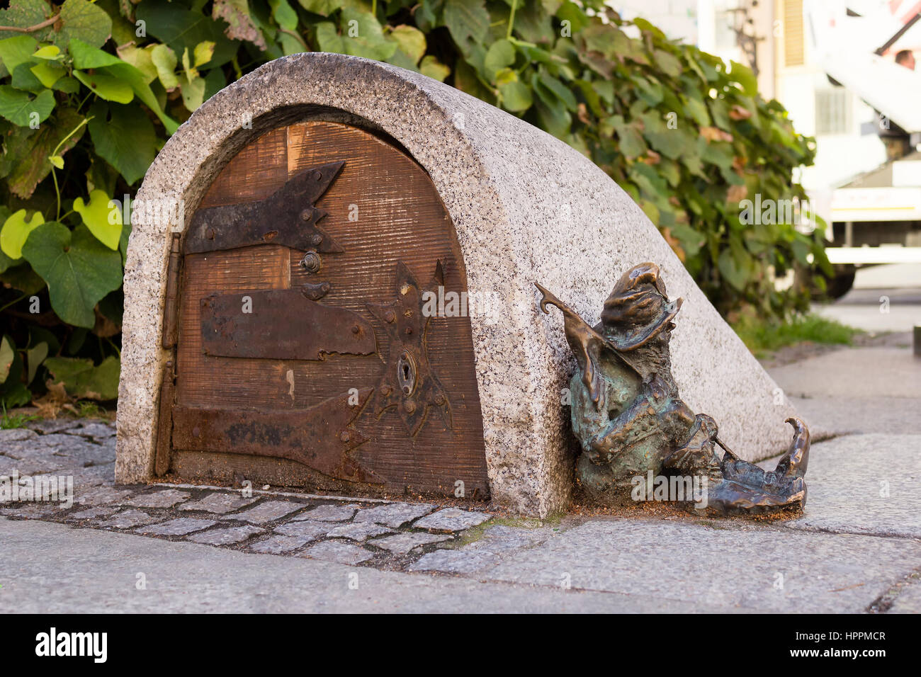 doors to the hobbit gnome house with Christmas decorations and shoes Stock  Photo