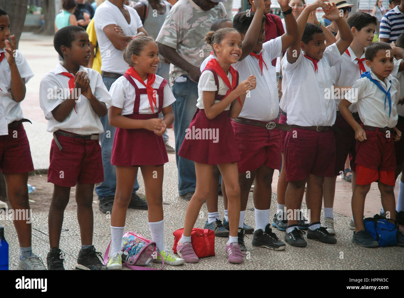 Clown entertaining young school children in the Parque Central, Havana, Cuba. Stock Photo