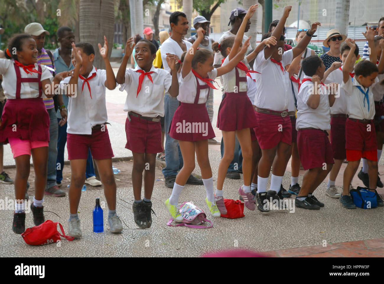 Clown entertaining young school children in the Parque Central, Havana, Cuba. Stock Photo