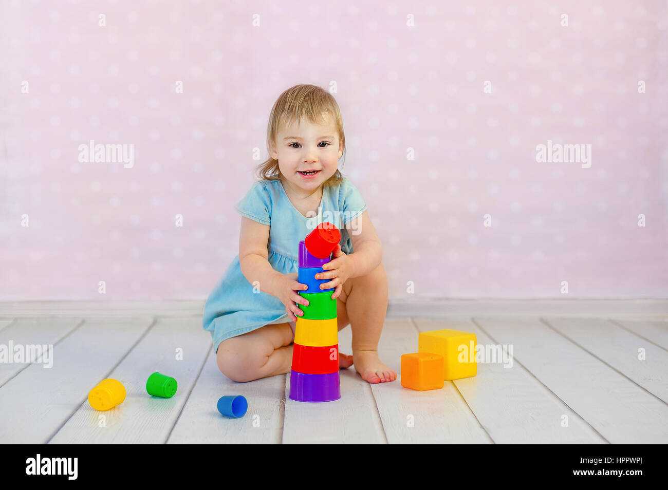 little girls playing with babies
