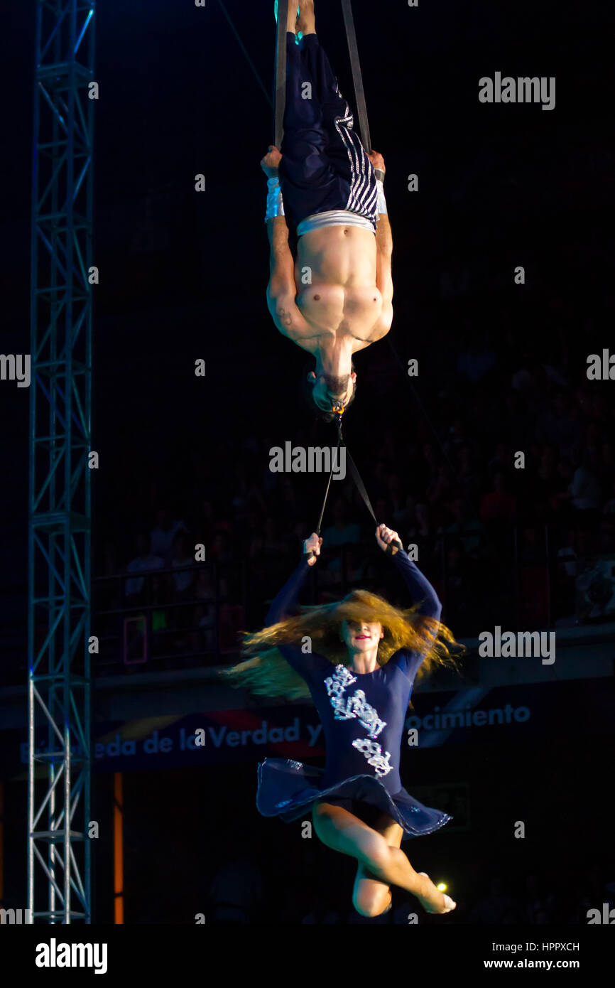 Couple performing aerial straps act. Jumbo Circus Stock Photo Alamy