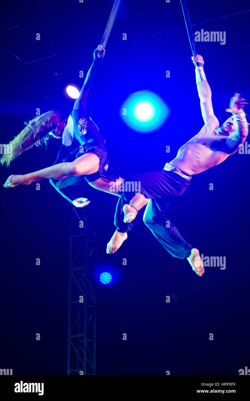 Couple performing aerial straps act. Jumbo Circus Stock Photo Alamy