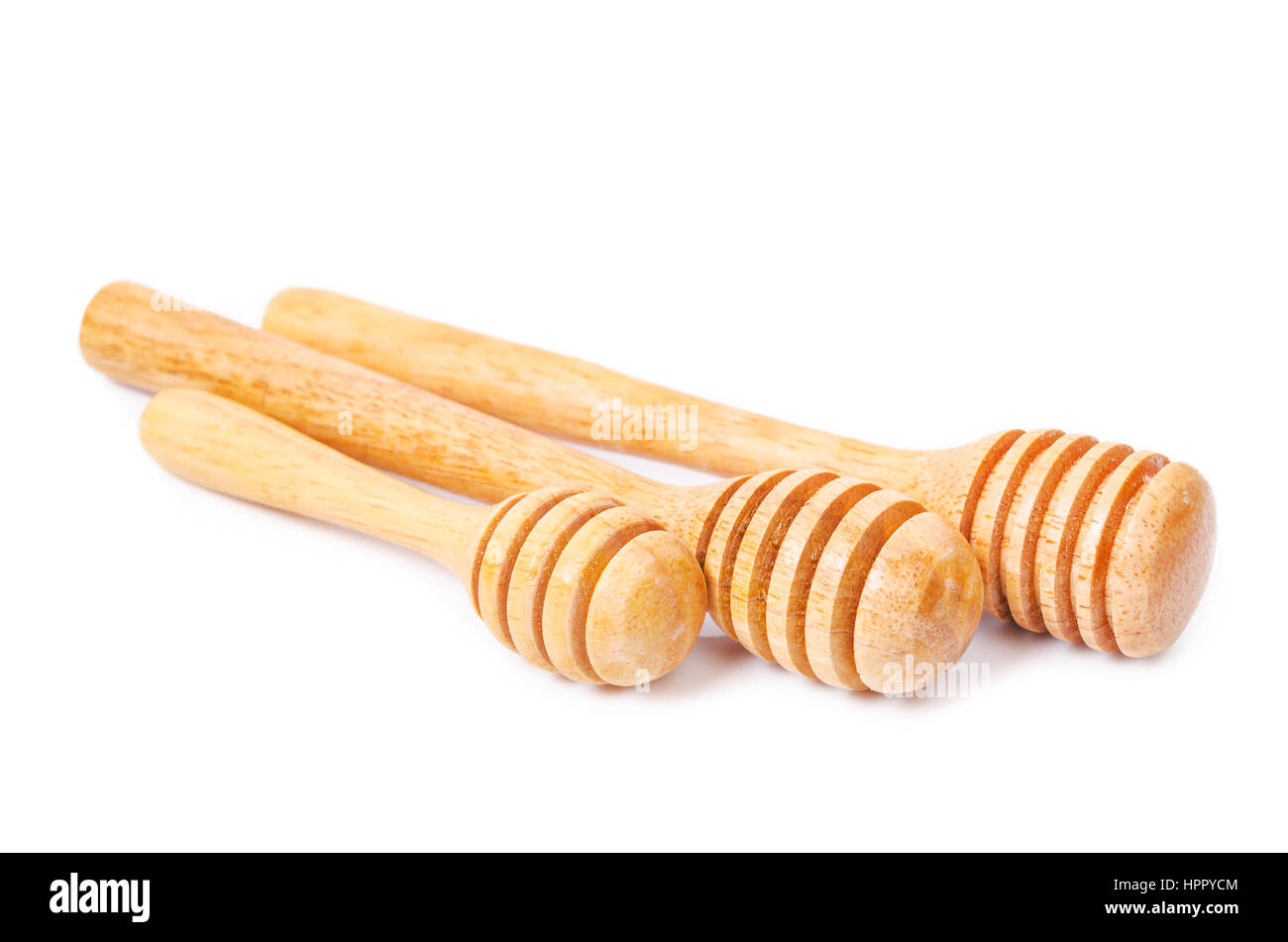 Wooden honey stick isolated on white background Stock Photo - Alamy